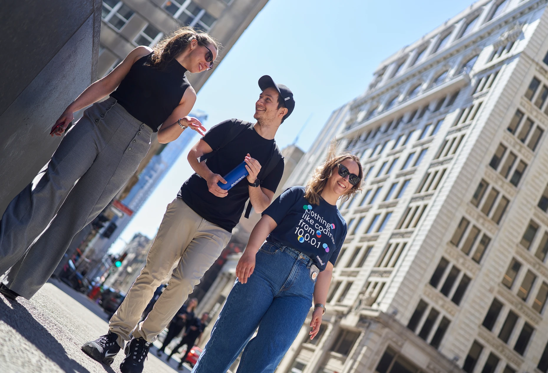 Colleagues walking outside nventive's Montreal office.